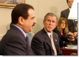 President George W. Bush and King of Bahrain Hamad bin Isa Al Khalifa address the media in the Oval Office Monday, Feb. 3, 2003.   White House photo by Paul Morse