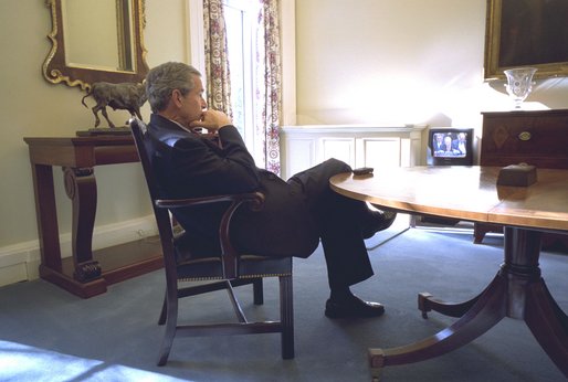 President George W. Bush watches at the White House the broadcast of Secretary of State Colin Powell's address at the United Nations Wednesday, February 5, 2003. White House photo by Eric Draper