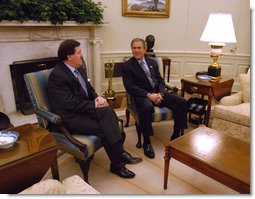President George W. Bush meets with NATO Secretary General Lord Robertson in the Oval Office Wednesday, Feb 19, 2003.  White House photo by Eric Draper