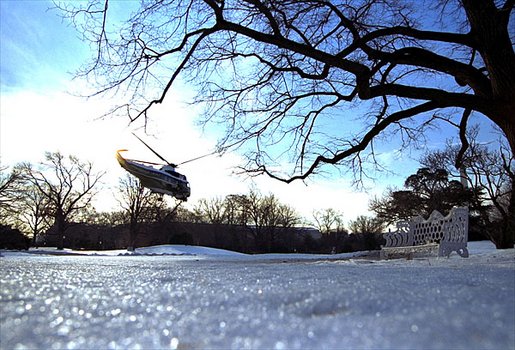 The President's helicopter, Marine One, lifts off from an icy South Lawn as he heads toward Georgia to meet with small business owners Thursday, Jeb. 20, 2003. White House photo by Tina Hager