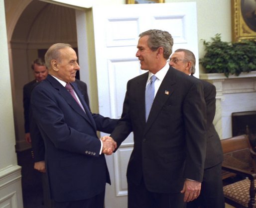 President George W. Bush welcomes Heydar Aliyev, President of Azerbaijan, to the Oval Office Wednesday, Feb. 26, 2003. White House photo by Eric Draper