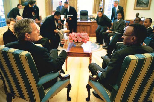 President George W. Bush meets with President Paul Kagame of Rwanda in the Oval Office Tuesday, March 4, 2003. White House photo by Paul Morse