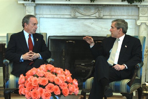 President George W. Bush talks with New York City Mayor Michael Bloomberg in the Oval Office Wednesday, March 19, 2003. Secretary of Homeland Security Tom Ridge, not pictured, also attended the meeting. The President discussed New York's security issues. White House photo by Eric Draper.