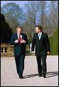 President Bush and Prime Minister Tony Blair of Great Britain walk on the grounds at Hillsborough Castle. Hillsborough, Northern Ireland, April 8, 2003. White House photo by Eric Draper.