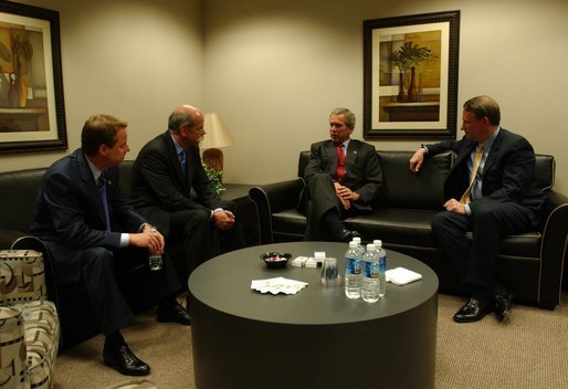 President George W. Bush meets with, from left, William Clay Ford Jr., Chairman & CEO of Ford Motor Company; Dieter Zetsche, President & CEO of Chrysler Group; and Richard Wagoner, President & CEO of General Motors Corp., at the Ford Community and Performing Arts Center in Dearborn, Mich., Monday, April 28, 2003. White House photo by Tina Hager