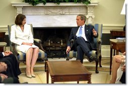 President George W. Bush meets with judicial nominee Priscilla Owen in the Oval Office. File Photo.  White House photo by Paul Morse