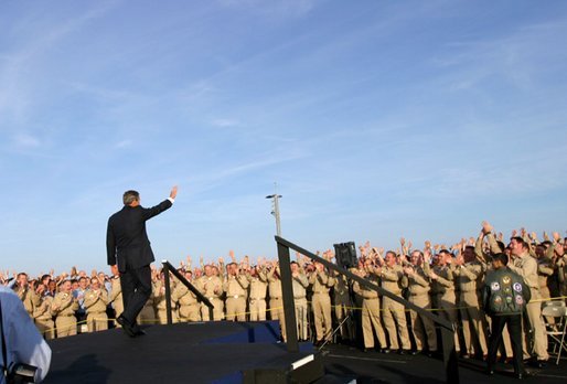 The President acknowledges sailors after addressing the nation from the flight deck of the USS Abraham Lincoln May 1, 2003. White House photo by Paul Morse