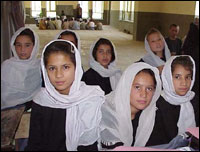 Afghan schoolgirls in class, many of them for the first time.
