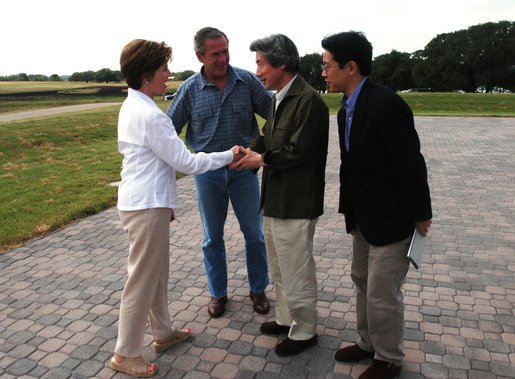 President George W. Bush and Laura Bush greet Japanese Prime Minister Junichiro Koizumi at their Texas ranch Thursday afternoon, May 22, 2003. White House photo by Eric Draper