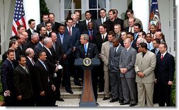 President George W. Bush welcomes the 2002 World Series Champion Anaheim Angels to the Rose Garden Tuesday, May 27, 2003.  White House photo by Tina Hager