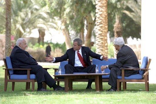 President George W. Bush meets with Prime Minister Ariel Sharon of Israel, left, and Prime Minister Mahmoud Abbas of the Palestinian Authority at Beit al Behar Palace in Aqaba, Jordan, June 4, 2003. White House photo by Eric Draper