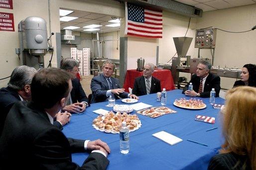 President George W. Bush speaks during a meeting with small business owners and employees at Andrea Foods in Orange, N.J., Monday, June 16, 2003. White House photo by Eric Draper