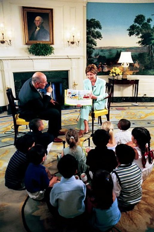 Laura Bush reads to children during an appearance on a morning show broadcast from the Diplomatic Reception Room in the White House, June 25, 2003. White House photo by Susan Sterner