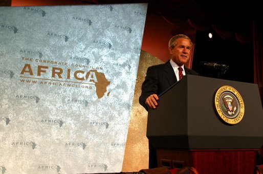 President George W. Bush addresses the Corporate Council on Africa's U.S.- Africa Business Summit in Washington, D.C., Thursday, June 27, 2003. "All of us here today share some basic beliefs. We believe that growth and prosperity in Africa will contribute to the growth and prosperity of the world. We believe that human suffering in Africa creates moral responsibilities for people everywhere. We believe that this can be a decade of unprecedented advancement for freedom and hope and healing and peace across the African continent," President Bush said. White House photo by Paul Morse.