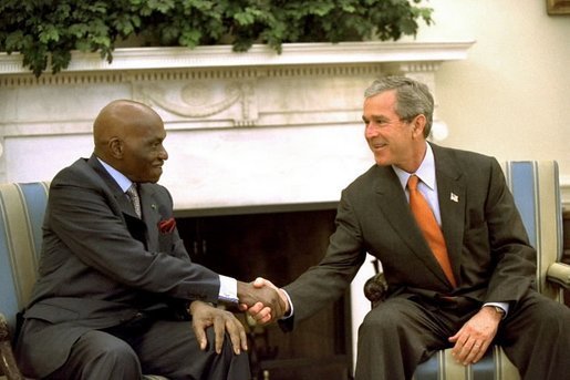 President George W. Bush met with President Abdoulaye Wade of Senegal today in Senegal. This photo was taken when President Wade met with President Bush in the Oval Office on June 18, 2002. File photo.