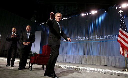 President George W. Bush waves after speaking at the 2003 National Urban League Conference in Pittsburgh Monday, July 28, 2003. White House photo by Paul Morse.