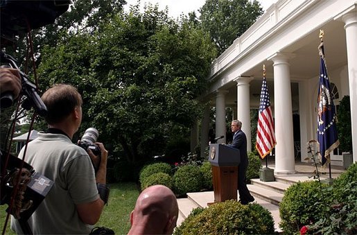 President George W. Bush addresses the media during a Rose Garden news conference Wednesday, July 30, 2003. President Bush discussed many topics including progress in Iraq, the Middle East, and the economy. White House photo by Paul Morse