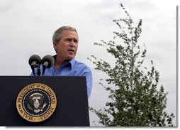 President George W. Bush talks about his healthy forest initiative in Redmond, Ore., Thursday, August 21, 2003.  White House photo by Paul Morse