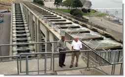 President George W. Bush talks with Witt Anderson during a tour of the Ice Harbor Lock and Dam in Burbank, Wash., Friday,August 22, 2003.  White House photo by Paul Morse