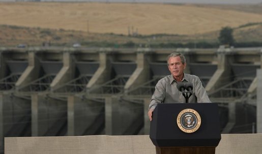 President George W. Bush discusses salmon restoration from Ice Harbor Locks and Dam in Burbank, Wash., Friday, August 22, 2003. "I was pleased to see the incredible care that goes in to protecting the salmon that journey up the river. It's an important message to send to people, it seems like to me, that a flourishing salmon population is a vital part of the vibrancy of this incredibly beautiful part of our country," said the President in his remarks about his tour of the facility. White House photo by Paul Morse.