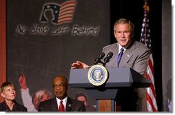 President George W. Bush highlights the tutoring and supplemental services provided in the No Child Left Behind Act in his remarks at Kirkpatrick Elementary School in Nashville, Tenn., Monday, Sept. 8, 2003.  White House photo by Tina Hager