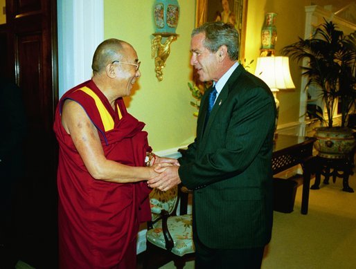 President George W. Bush welcomes the Dalai Lama to the White House Wednesday, September 10, 2003. White House photo by Paul Morse.