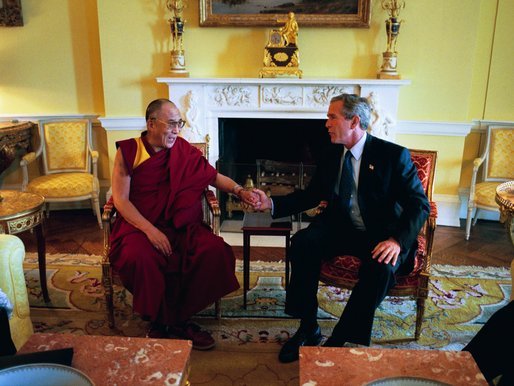 President George W. Bush meets with the Dalai Lama at the White House Wednesday, September 10, 2003. White House photo by Paul Morse.