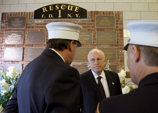 Commemorating the two-year anniversary of the terrorist attacks, Vice President Dick Cheney visits the firehouse of FDNY Rescue Company 1 in New York, N.Y., Sept. 11, 2003. Pictured in the background is a memorial to the station's firefighters who have died in the line of duty, including the company's eleven firefighters who lost their lives Sept. 11, 2001. White House photo by David Bohrer.