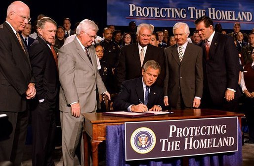 President George W. Bush signs the Homeland Security Appropriations Act of 2004 at the Department of Homeland Security in Washington, D.C., Wednesday, Oct. 1, 2003. "The Homeland Security bill I will sign today commits $31 billion to securing our nation, over $14 billion more than pre-September 11th levels. The bill increases funding for the key responsibilities at the Department of Homeland Security and supports important new initiatives across the Department," said the President in his remarks. White House photo by Tina Hager.