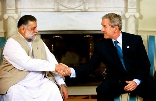 President George W. Bush meets with Prime Minister Mir Zafarullah Khan Jamali of Pakistan in the Oval Office Wednesday, Oct. 1, 2003. White House photo by Eric Draper.