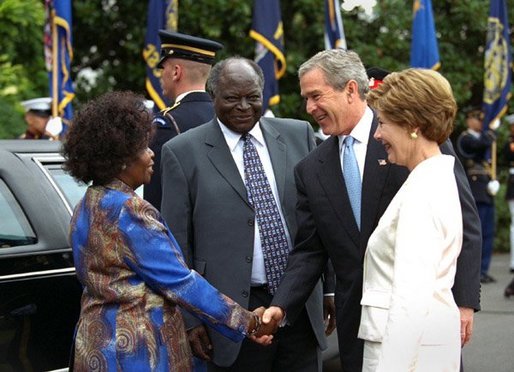 President George W. Bush and Mrs. Laura Bush welcome President Mwai Kibaki and Mrs. Kibaki of the Republic of Kenya to the White House Monday, October 5, 2003. White House photo by Eric Draper