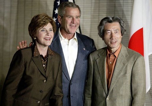 Photo.President George W. Bush and Laura Bush stand with Japanese Prime Minister Junichiro Koizumi before meeting for dinner in Tokyo during the first stop of the President's trip to Asia and Australia Thursday, Oct. 16, 2003. White House photo by Paul Morse