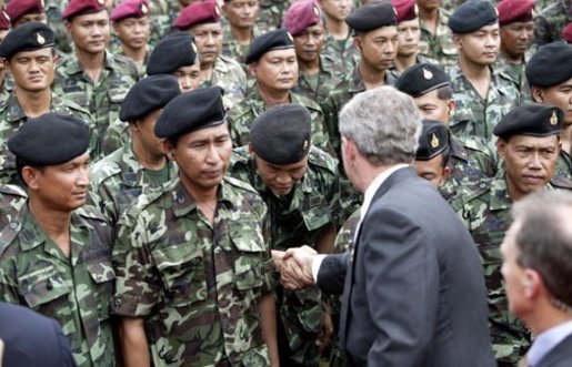 President George W. Bush greets Thai troops after his remarks at the Royal Thai Army Headquarters in Bangkok, Thailand, Sunday, Oct. 19, 2003. White House photo by Paul Morse.