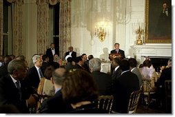 President George W. Bush hosts an Iftaar dinner celebrating Ramadan at the White House Monday, Oct. 28, 2003. "For Muslims in America, and around the world, this holy time is set aside for prayer and fasting," said President Bush. "It is also a good time for people of all faiths to reflect on the values we hold common -- love of family, gratitude to God, and a commitment to religious freedom."  White House photo by Susan Sterner
