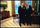 President George W. Bush meets with Mike Leavitt, the new administrator for the Environmental Protection Agency in the Oval Office Wednesday, Nov 12, 2003. White House photo by Eric Draper