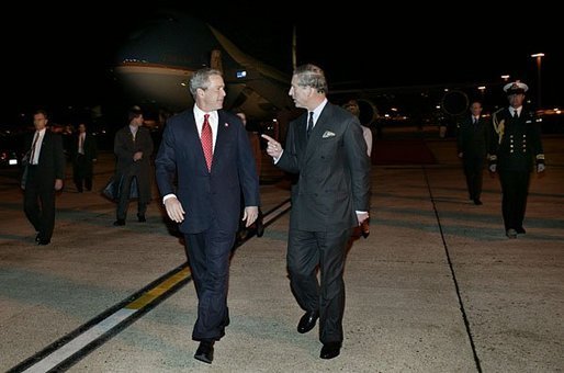 Arriving in London for a State Visit to the United Kingdom, President George W. Bush is greeted by Prince Charles at London Heathrow Airport Tuesday, Nov. 18, 2003. This State Visit is the first time an American President has visited as a guest of the Queen since President Reagan's visit in 1982. White House photo by Eric Draper.
