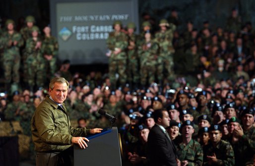 President George W. Bush delivers remarks to U.S. soldiers and families at Fort Carson, Colorado Nov. 24, 2003 White House photo by Tina Hager
