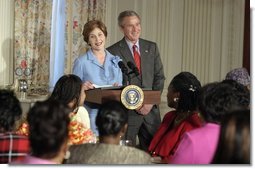 President George W. Bush drops-by Mrs. Laura Bush's luncheon for African American clergy spouses at the White House on January 19, 2004.   White House photo by Paul Morse