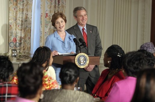 President George W. Bush drops-by Mrs. Laura Bush's luncheon for African American clergy spouses at the White House on January 19, 2004. White House photo by Paul Morse.