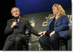 President George W. Bush introduces student Rebecca Albritton during a discussion on job training and the economy at Owens Community College in Perrysburg Township, Ohio, Wednesday, Jan. 21, 2004.  White House photo by Eric Draper