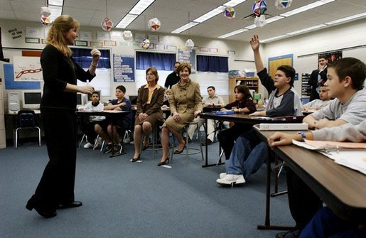 Laura Bush visits Ms. Elaine Brindley’s reading class during a trip to Discovery Middle School in Orlando, Fla., Wednesday, Jan. 21, 2004. White House photo by Tina Hager