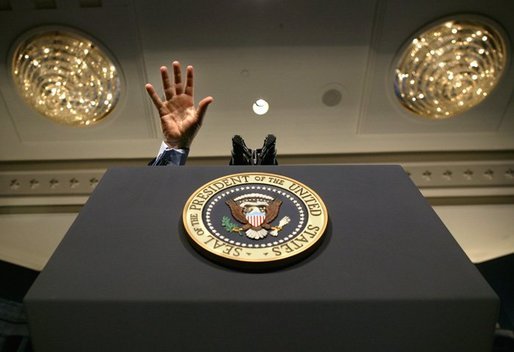 President George W. Bush gestures during his remarks at the United States Conference of Mayors in Washington, D.C., Friday, Jan. 23, 2004. White House photo by Eric Draper.