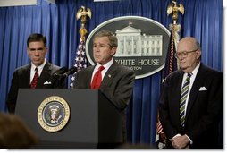 President George W. Bush holds a press briefing at the White House Friday, Feb. 6, 2004. "Today, by executive order, I am creating an independent commission, chaired by Governor and former Senator Chuck Robb (left), Judge Laurence Silberman (right), to look at American intelligence capabilities, especially our intelligence about weapons of mass destruction," said the President.   White House photo by Paul Morse