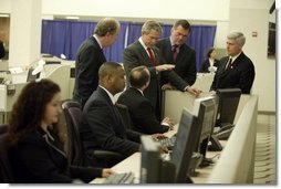 President George W. Bush tours the National Targeting Center in Reston, Va., Friday, February 6, 2004. Part of Homeland Security's Bureau of Customs and Border Protection, the center provides analytical research support for counterterrorism efforts.  White House photo by Paul Morse