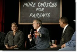 President George W. Bush talks about parental options and school choice at Archbishop Carroll High School in Washington, D.C., Friday, Feb. 13, 2004.  White House photo by Paul Morse