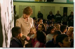 Laura Bush is greeted by students at Limerick Elementary School in Los Angeles, California, Wednesday, February 18, 2004.  White House photo by Tina Hager