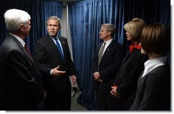 President George W. Bush talks with small business owners and employees of ISCO Industries in Louisville, Ky., Thursday, Feb. 26, 2004.  White House photo by Tina Hager