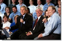 President George W. Bush participates in a conversation on the economy with employees of ISCO Industries in Louisville, Ky., Thursday, Feb. 26, 2004.  White House photo by Tina Hager