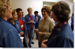 Laura Bush visits with military wives at the Fort Hood Women's Conference in Fort Hood, Texas, Friday, March 5, 2004. "Today, we celebrate you, the women in the United States military who are married to military officers or enlisted men, or who are military women, themselves. And we celebrate all that you do to make our military the strongest in the world," said Mrs Bush in her remarks to the conference.  White House photo by Tina Hager