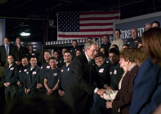President George W. Bush greets employees of USA Industries, after a conversation on the economy and job training in Bay Shore, New York, Thursday, March 11, 2004. White House photo by Eric Draper.